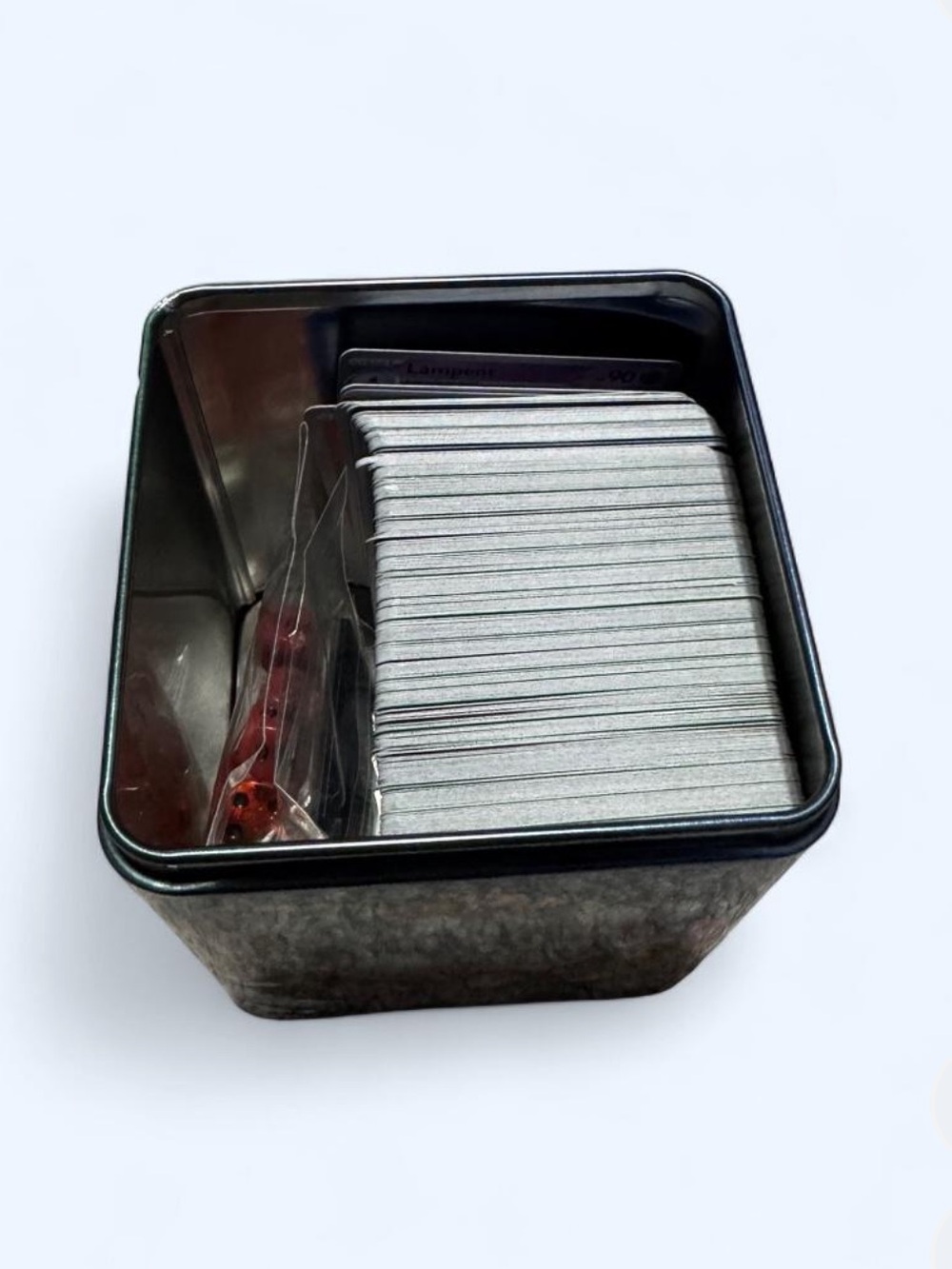 About 150+ Pokemon Trading Cards (some holo / rev holos) in tin with tcg things